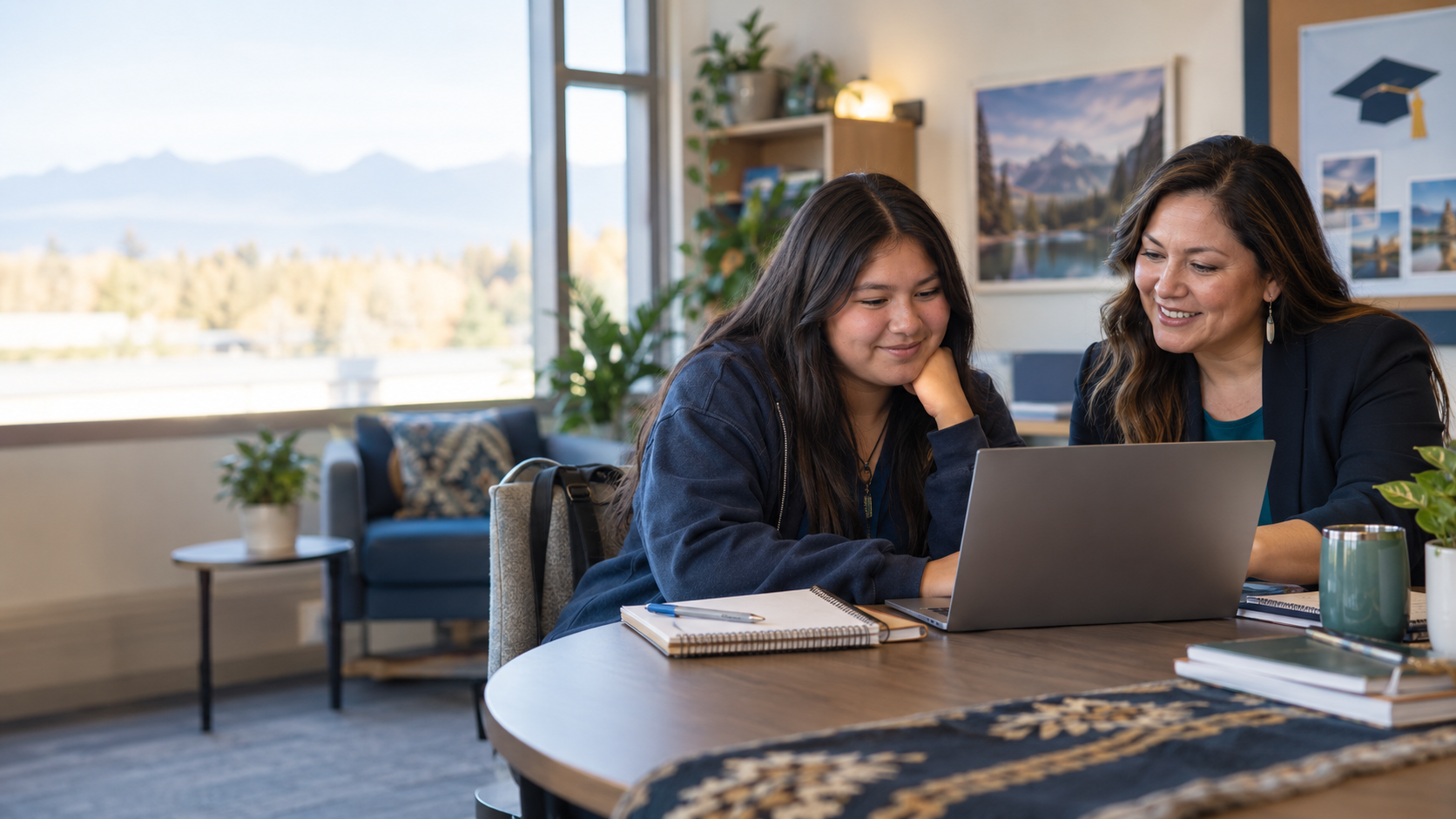 A student and school counselor exploring college-planning resources together